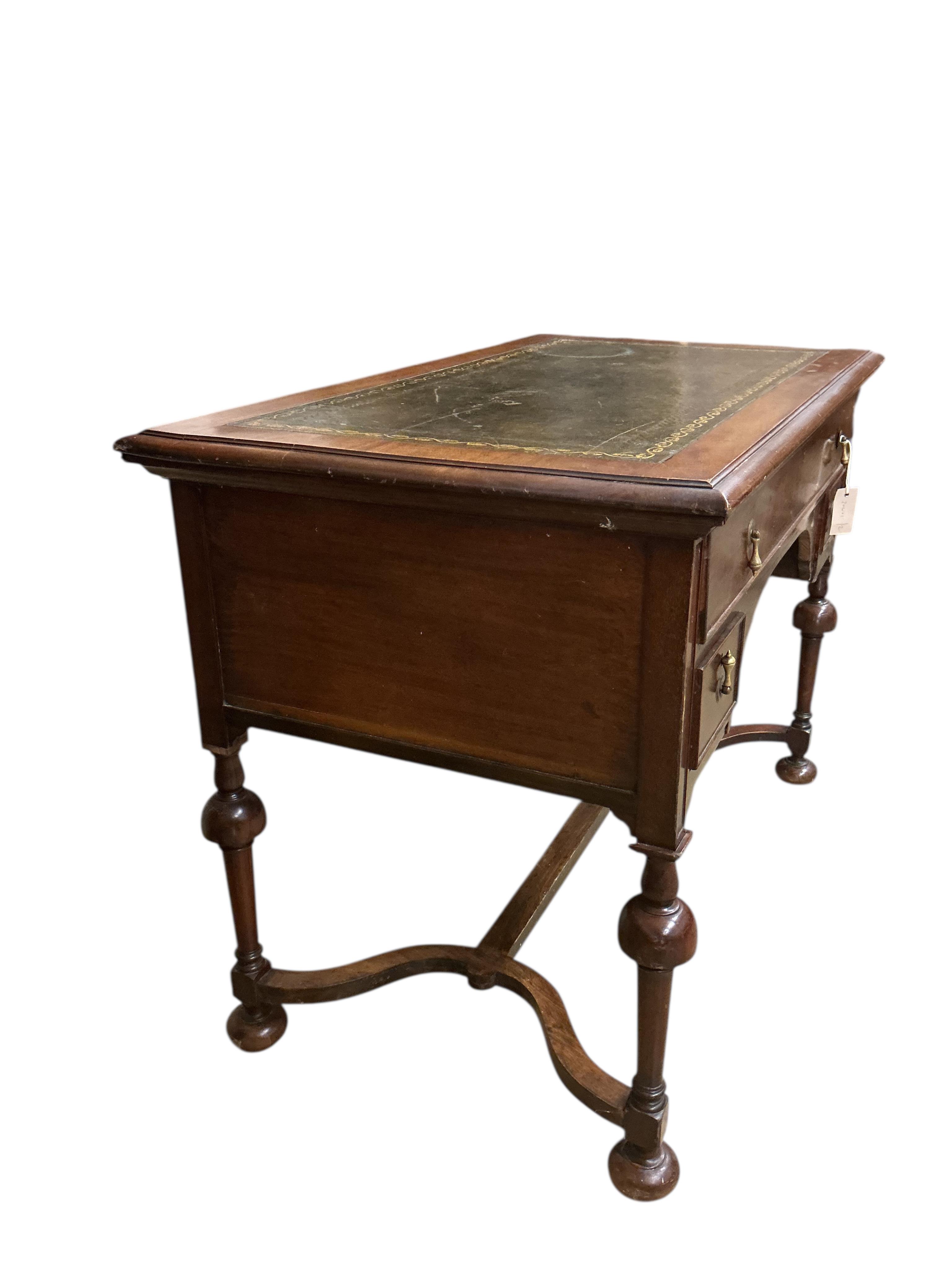 An early 20th century William and Mary style rectangular mahogany writing table, width 106cm, depth 60cm, height 76cm